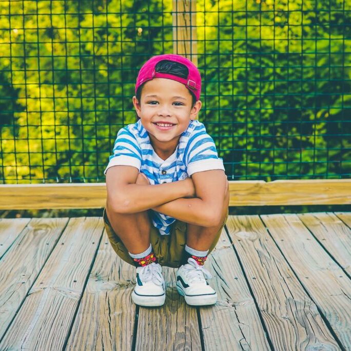 Happy child smiling after a gentle pediatric dental cleaning at Healthy Teeth Pediatric Dentistry in Sugar Land, TX